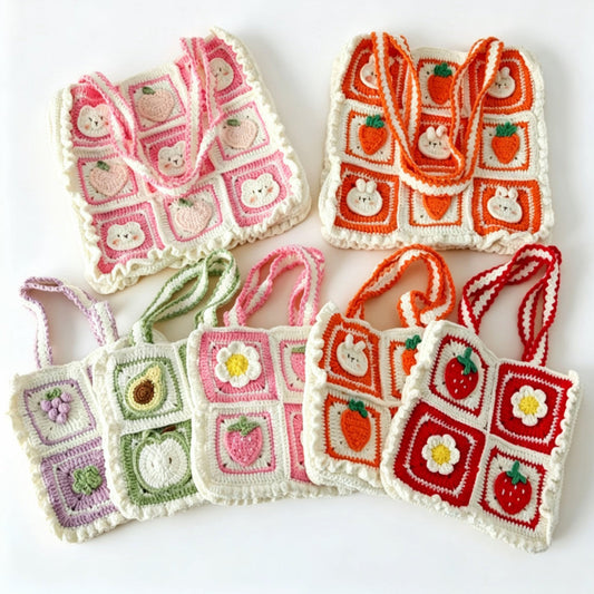 Colorful handmade crochet bags with various fruits 
