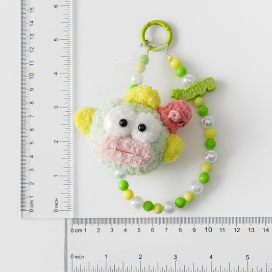 Colorful sanrio fishman keychain with a ruler for refer size